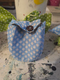 Polka dot mini backpack with a big bow.