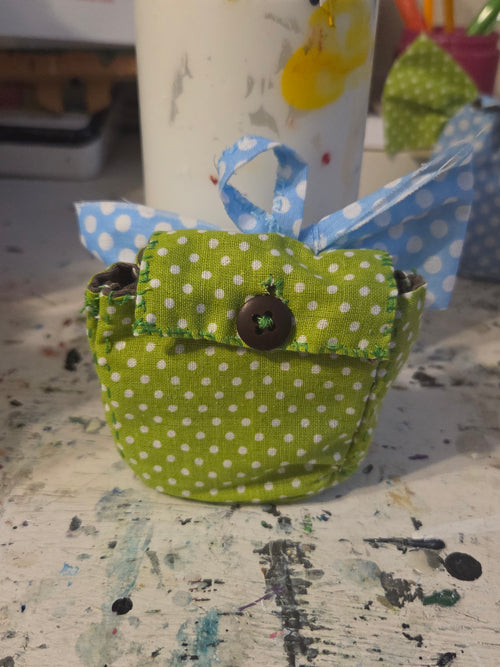 Polka dot mini backpack with a big bow.